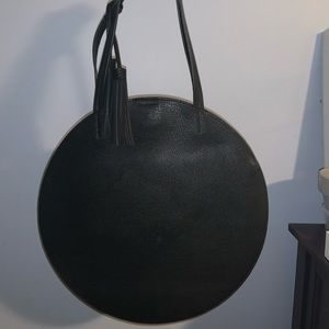 Round black handbag
